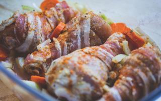 Marios Italian Deli | Picture of Bacon-Wrapped Drumsticks with Vegetables