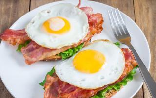 image of American Cheese, Bacon, and Fried Eggs Open Faced Sandwich Recipe Marios Meat Market and Deli