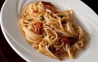 image of pasta with pignoli nuts and sun dried tomatoes recipe Marios Meat Market and Deli